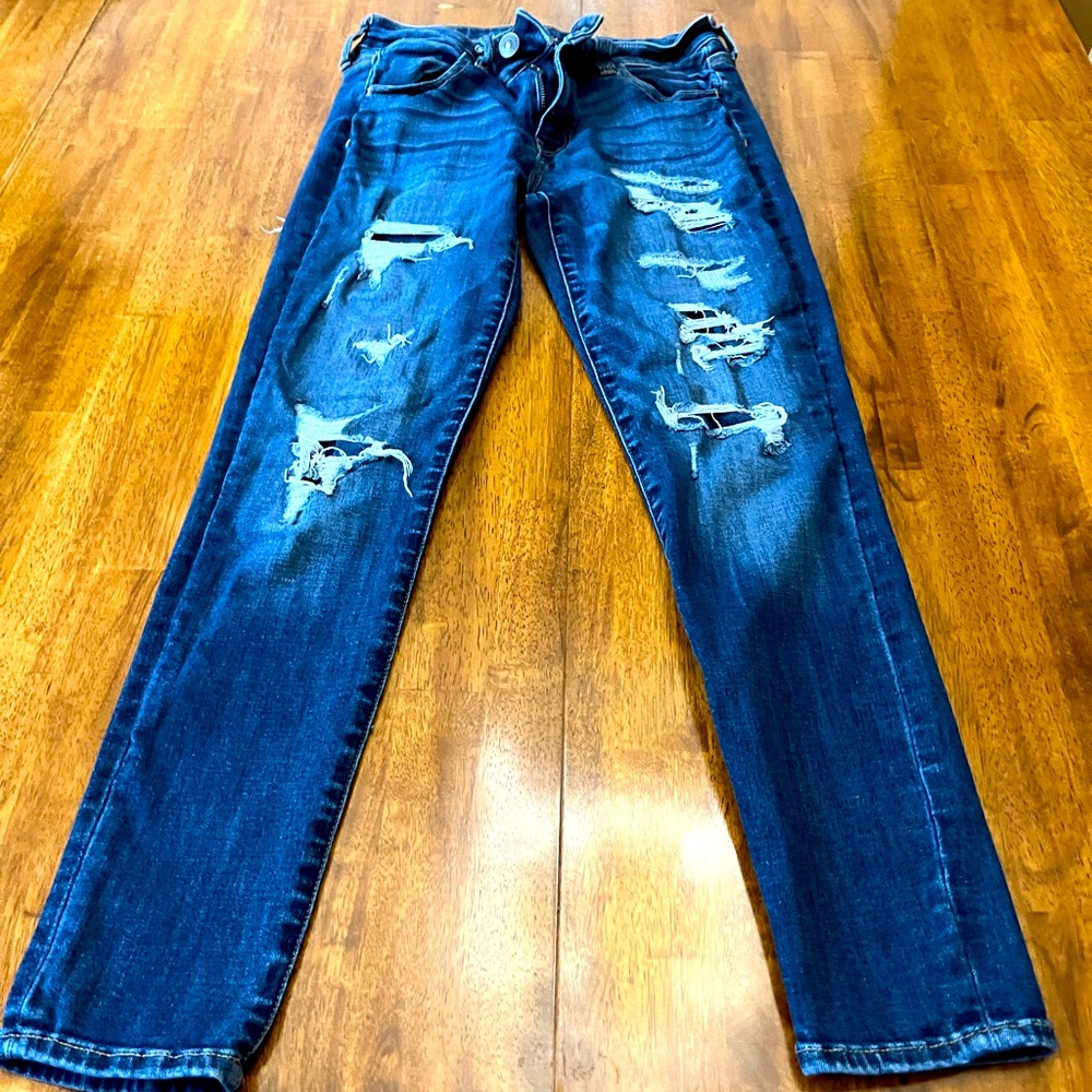 Blue Size 6. patched rips american eagle Jeans.